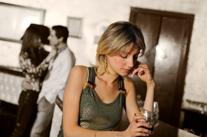 girls night out: girl alone in a pub